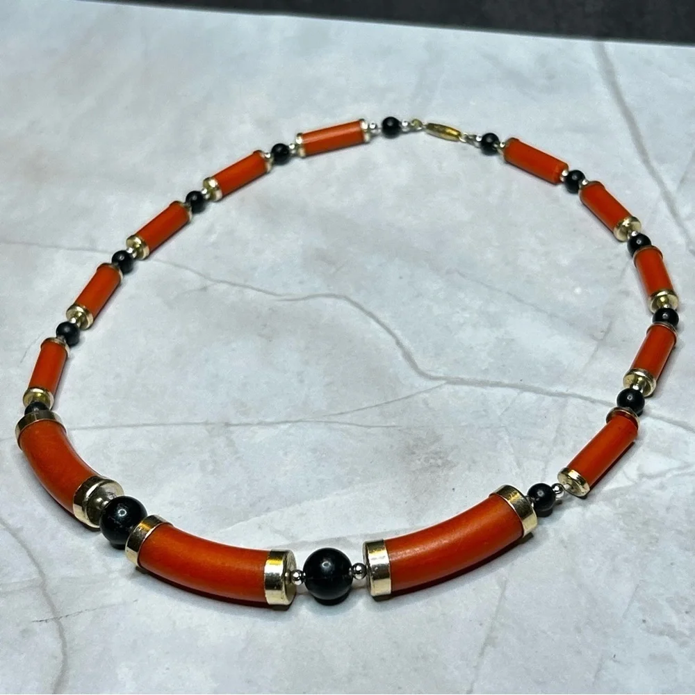 Unique Orange and Black Beaded Necklace with Gold Tone Accents